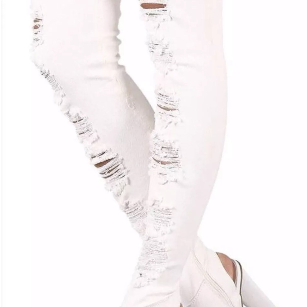 White ripped jean boots